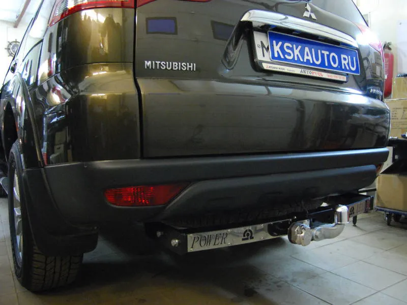 Фаркоп Лидер-Плюс для Mitsubishi Pajero Sport III 2016-2020 (с накладкой из нержавеющей стали)