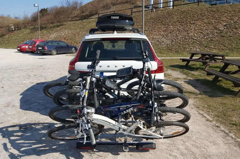 Автомобильный багажник Amos TYTAN 4 PLUS на фаркоп для перевозки 4-х велосипедов