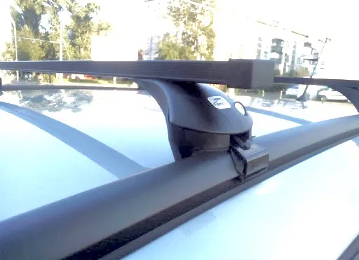 Багажник на интегрированные рейлинги Amos Boss для Jaguar XF Sportbrake универсал 2017-2020 (Прямоугольные дуги)