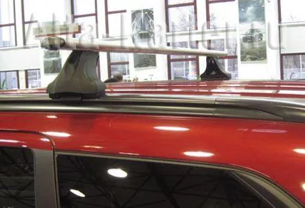 Багажник на интегрированные рейлинги Атлант для Kia Sportage IV 2016-2020 (Аэродинамические дуги)